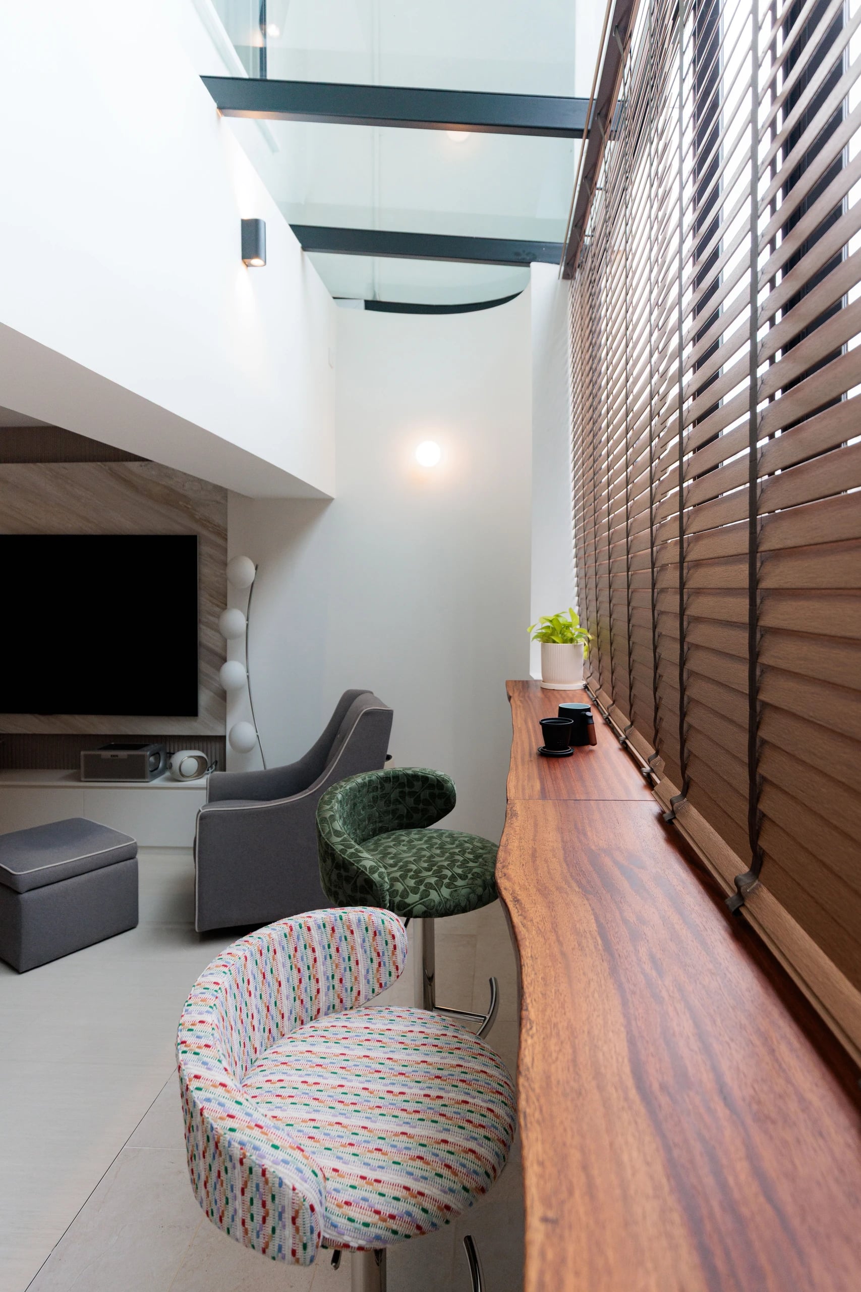 Balcony with glass roof and blinds