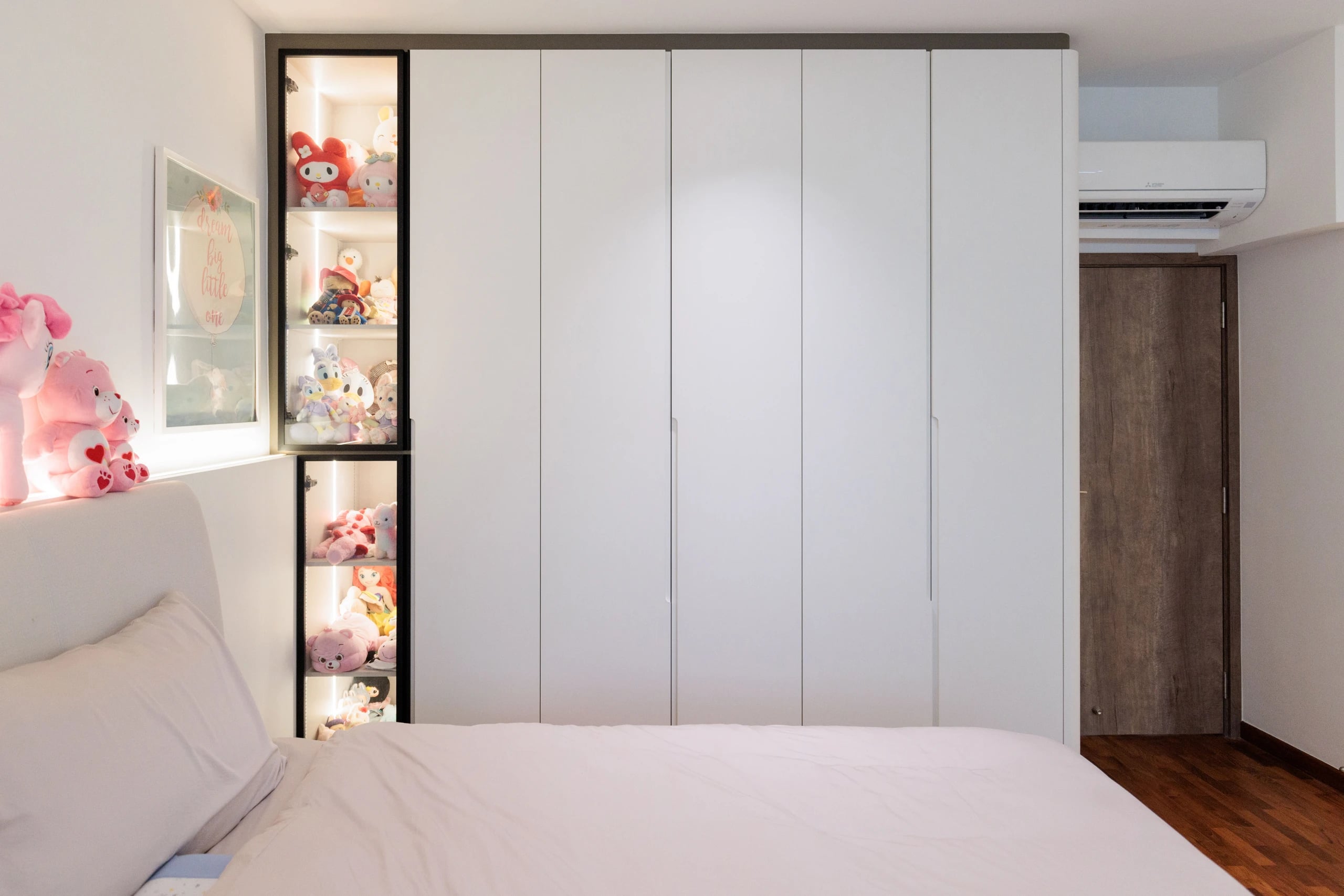 Kids room with glass cabinets